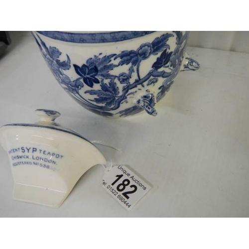 182 - An Unusual Wedgwood blue and white peony pattern 'Tipsy' teapot. Chip on lid rim otherwise in good c... 