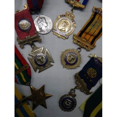 196 - A mixed lot of 20th century medals etc.,