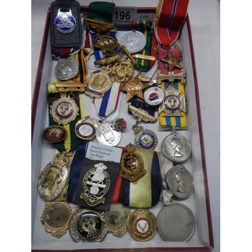 196 - A mixed lot of 20th century medals etc.,