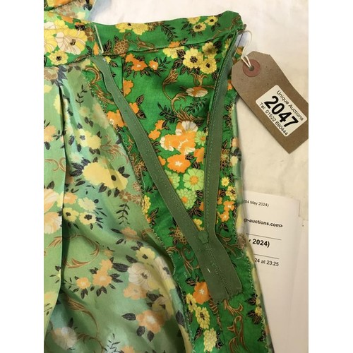 2047 - A Vintage 1970's handmade pure silk skirt. Bright green with floral print