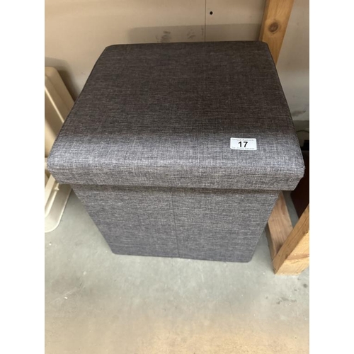 17 - An upholstered foot stool / storage box