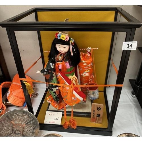 34 - A Japanese water-bearer doll in a glassless case (Case frame only part disassembles)