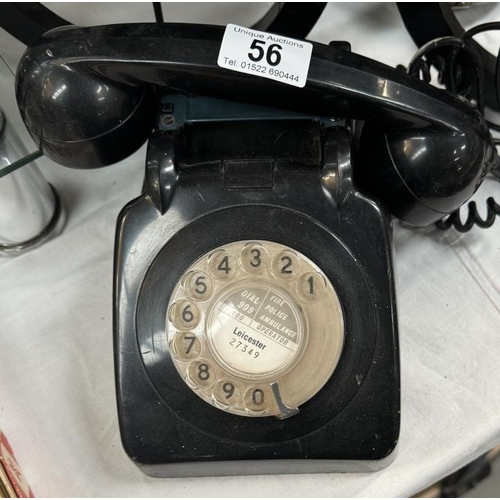 56 - A vintage black dial telephone