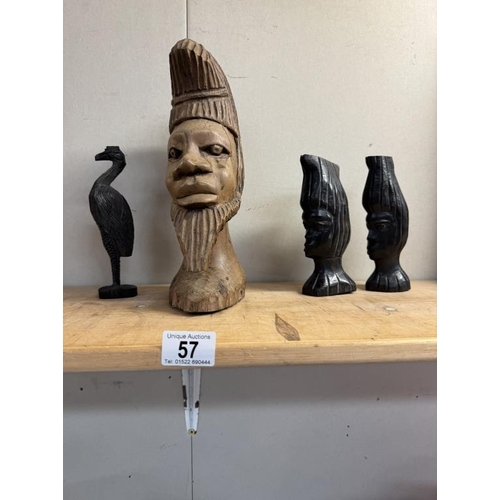 57 - A carved wood African head & 3 others