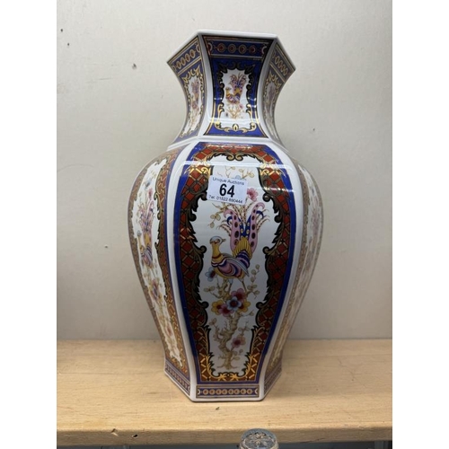 64 - A large gilded and coloured vase