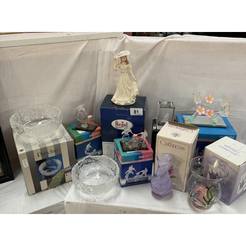 81 - A quantity of boxed items including handmade glass humming birds, Caithness vase etc