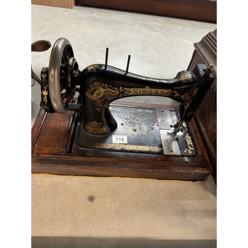 119 - A vintage ornate Singler sewing machine (Hand cranked)