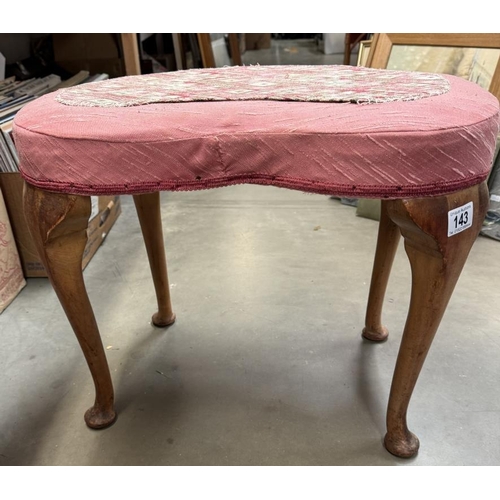 143 - A 1930's kidney shaped dressing table stool