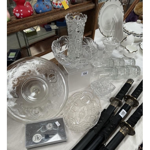 154 - A selection of moulded glass including centrepiece with vase