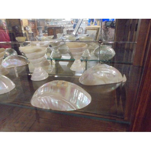 350A - A quantity of mother of pearl items including goblets.