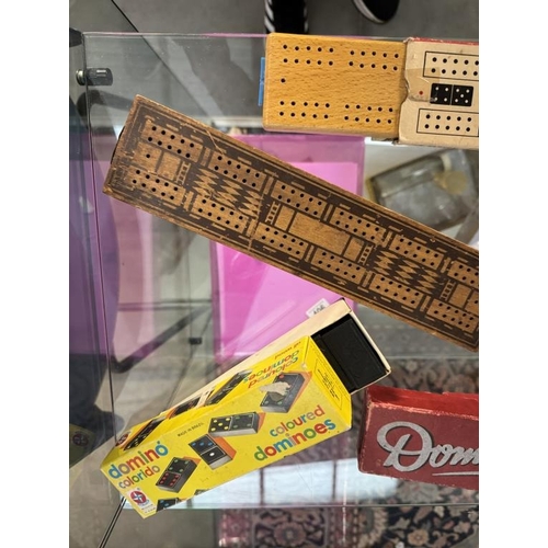 404 - A quantity of cribbage boards, dominoes & playing cards