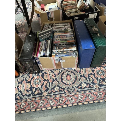 414 - A quantity of CD's, DVDs etc with racks & cases