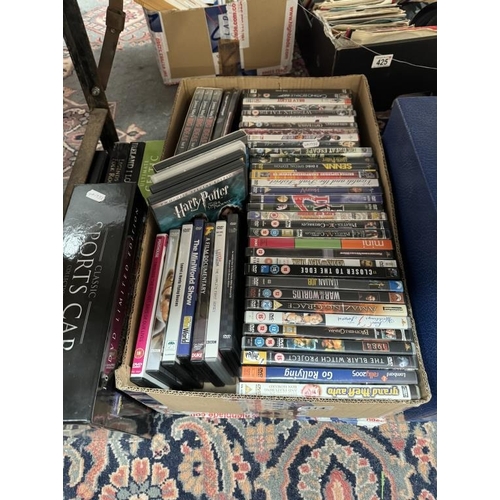 414 - A quantity of CD's, DVDs etc with racks & cases