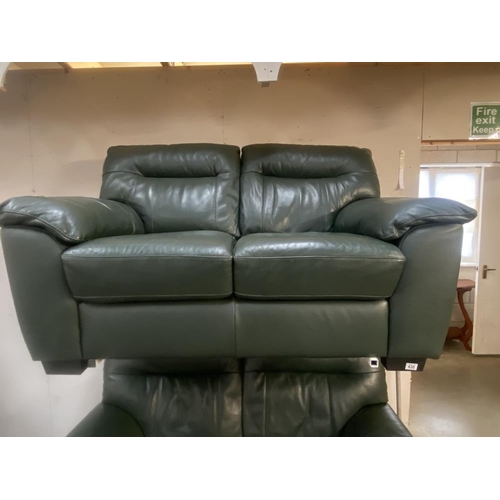 430 - A green leather 2 seat settee