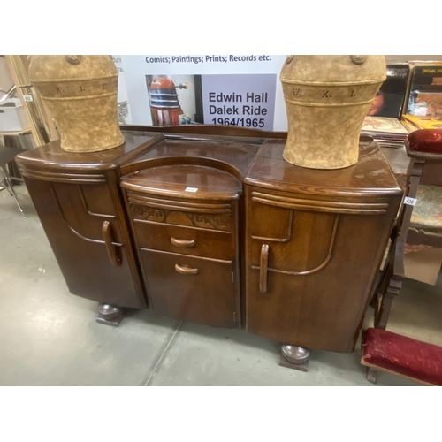 434 - A 1930's oak sideboard