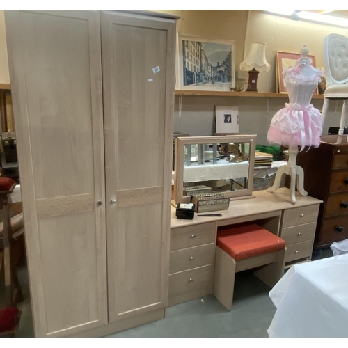 437 - A lightwood effect 3 piece bedroom suite, comprising of wardrobe, dressing table and stool and a bed... 