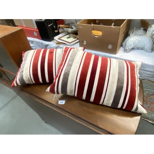 445 - 2 cushions with feather inserts