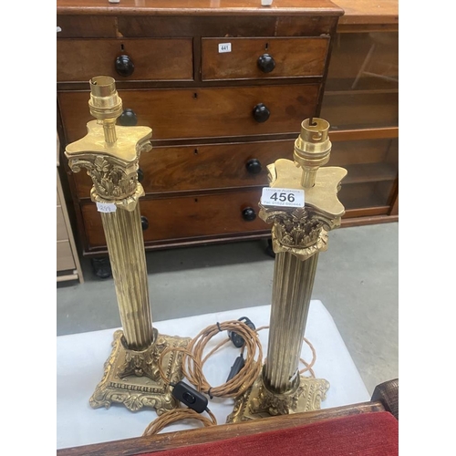 456 - A pair of solid brass tall corinthian column table lamps