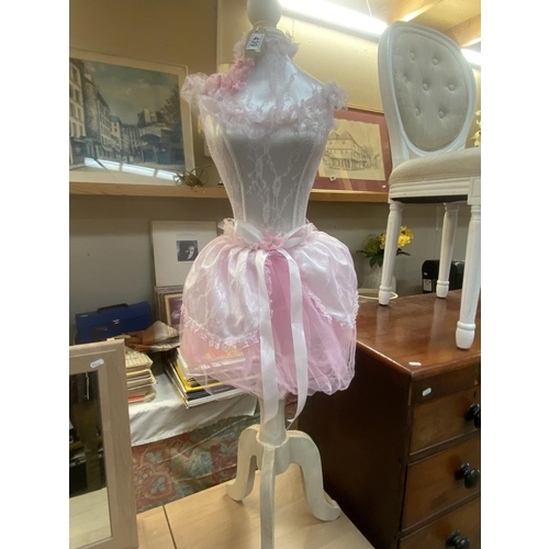 439 - A mannequin with pink netting and embellishments