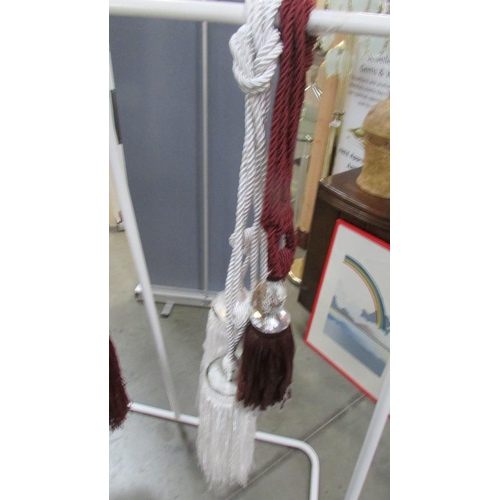 430E - Large red wine and gold curtain tie back with tassel and gem style embellishment and a pair of white... 