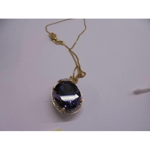 1009 - A 9ct gold ring set amethyst coloured stone, size O half with matching pendant, 7.25 grams total.