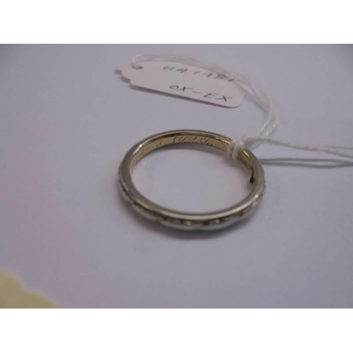 1012 - An 18ct white gold wedding ring, size N, 3.29 grams.