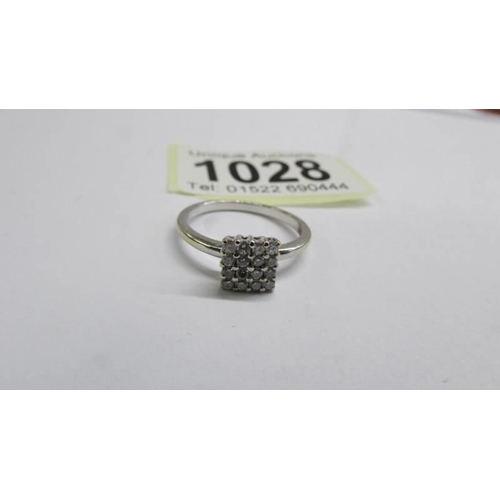 1028 - An art deco 18ct gold square pattern diamond ring, size N, 2.37 grams.