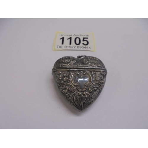 1105 - A heart shaped silver pill box/pendant.