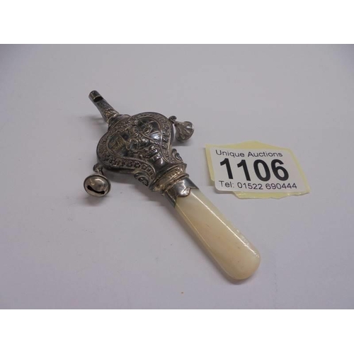 1106 - A 19th century silver and mother of pearl rattle with bells and whistle.