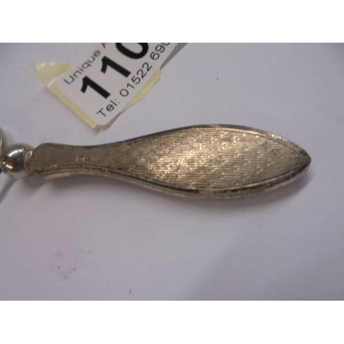 1107 - A silver handled magnifying glass.