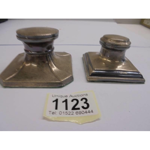 1123 - Two silver inkwells.