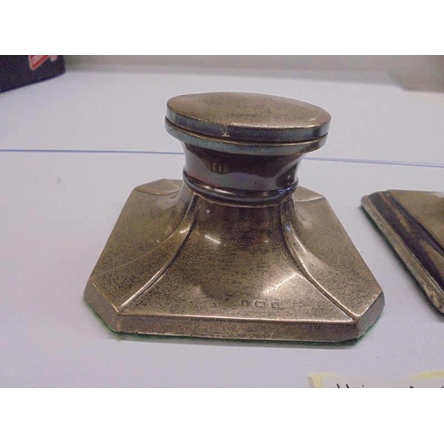 1123 - Two silver inkwells.