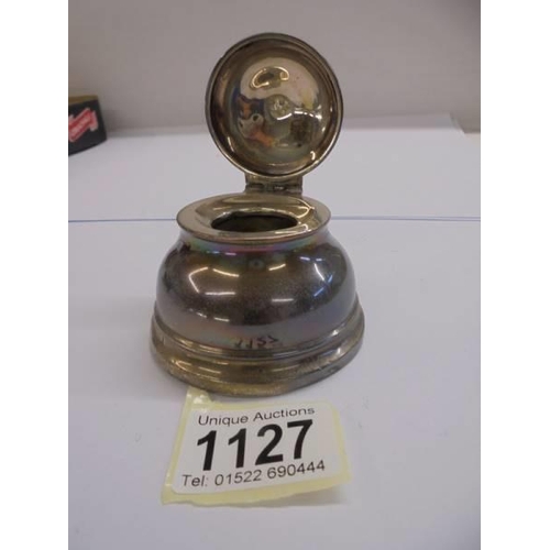 1127 - A silver inkwell.