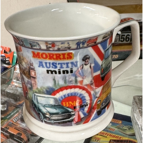 49 - A quantity of Mini models by Cararama, Vitesse etc and Mini collectable cards and a mug