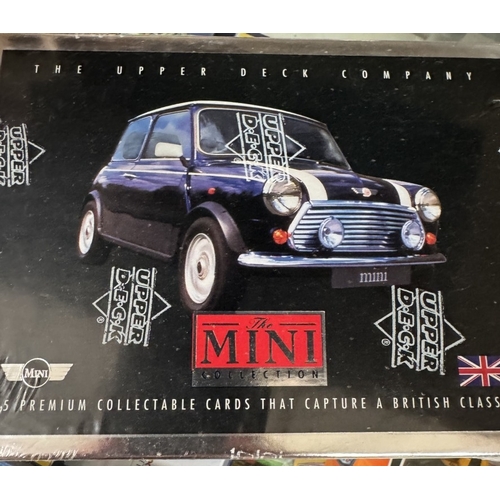 49 - A quantity of Mini models by Cararama, Vitesse etc and Mini collectable cards and a mug