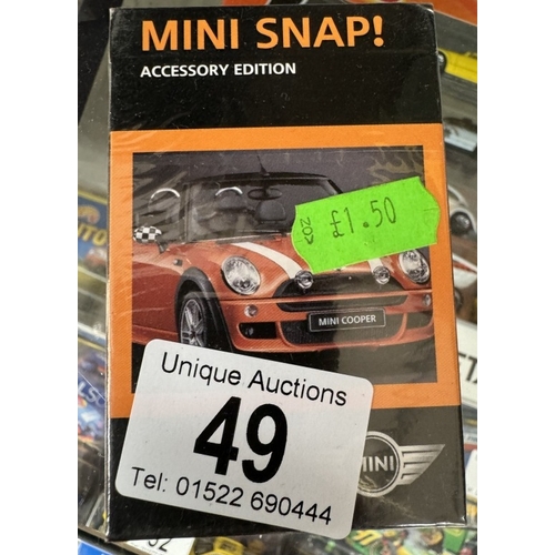 49 - A quantity of Mini models by Cararama, Vitesse etc and Mini collectable cards and a mug