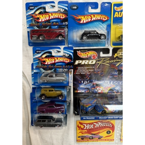 52 - 14 Hot wheels and 3 Hot Wheel Pro Racers in blister packs