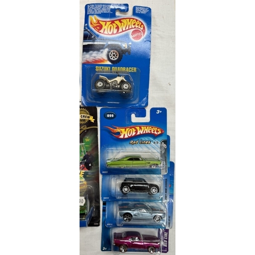 52 - 14 Hot wheels and 3 Hot Wheel Pro Racers in blister packs