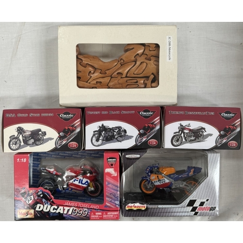 54 - 25 boxed motorcycle models by Atlas, Italeri etc and a wooden motorcycle jigsaw