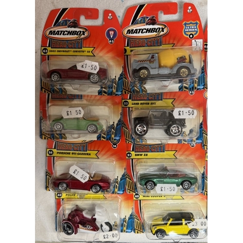 64 - 17 Matchbox hero city vehicles in blister packs