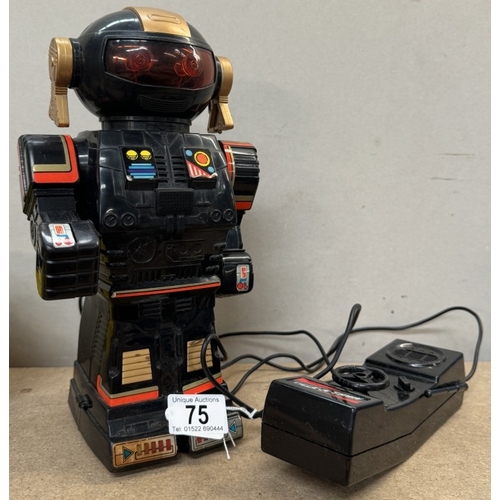 75 - A battery operated plastic robot, untested