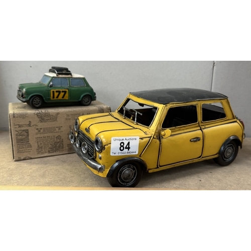 84 - A boxed resin Shudehill racing mini & a large pressed steel mini