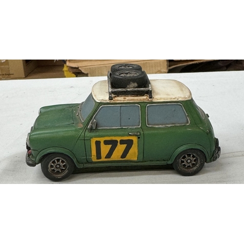 84 - A boxed resin Shudehill racing mini & a large pressed steel mini