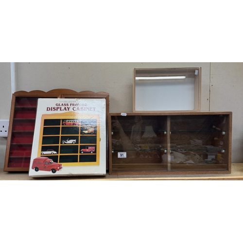 91 - 4 Collectors display cabinets, 1 boxed.