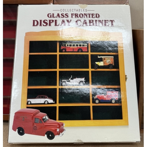 91 - 4 Collectors display cabinets, 1 boxed.