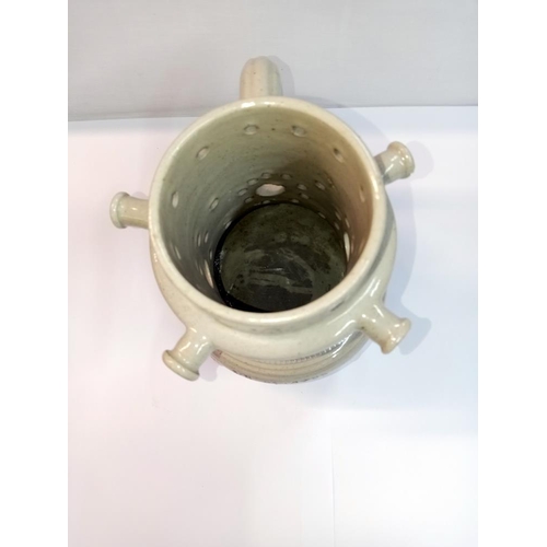 1253 - A 19th century stoneware jasperware puzzle jug, Height 20cm (handle repaired)