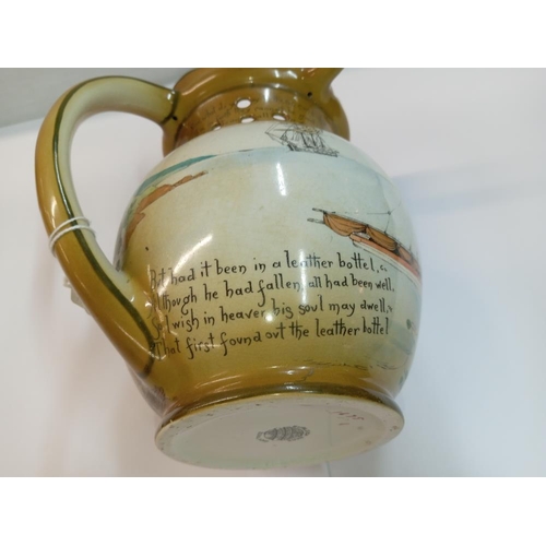 1255 - A Burgess & Leigh burleigh ware pictorial puzzle jug. Height 20cm