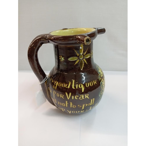 1257 - C H Brannam barum pottery puzzle jug. Height 17.5cm