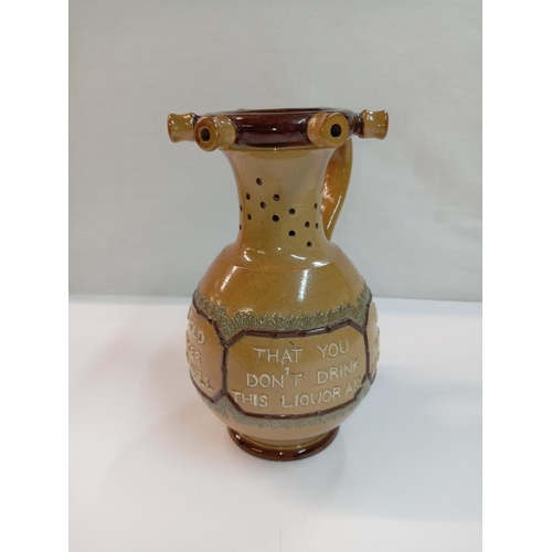 1259 - A Doulton Burslem puzzle jug. Height 17.5cm