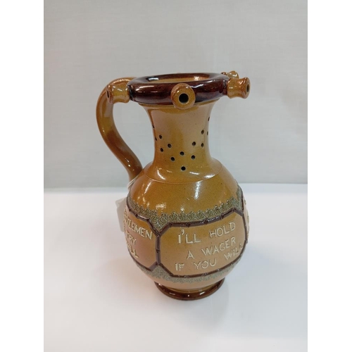 1259 - A Doulton Burslem puzzle jug. Height 17.5cm